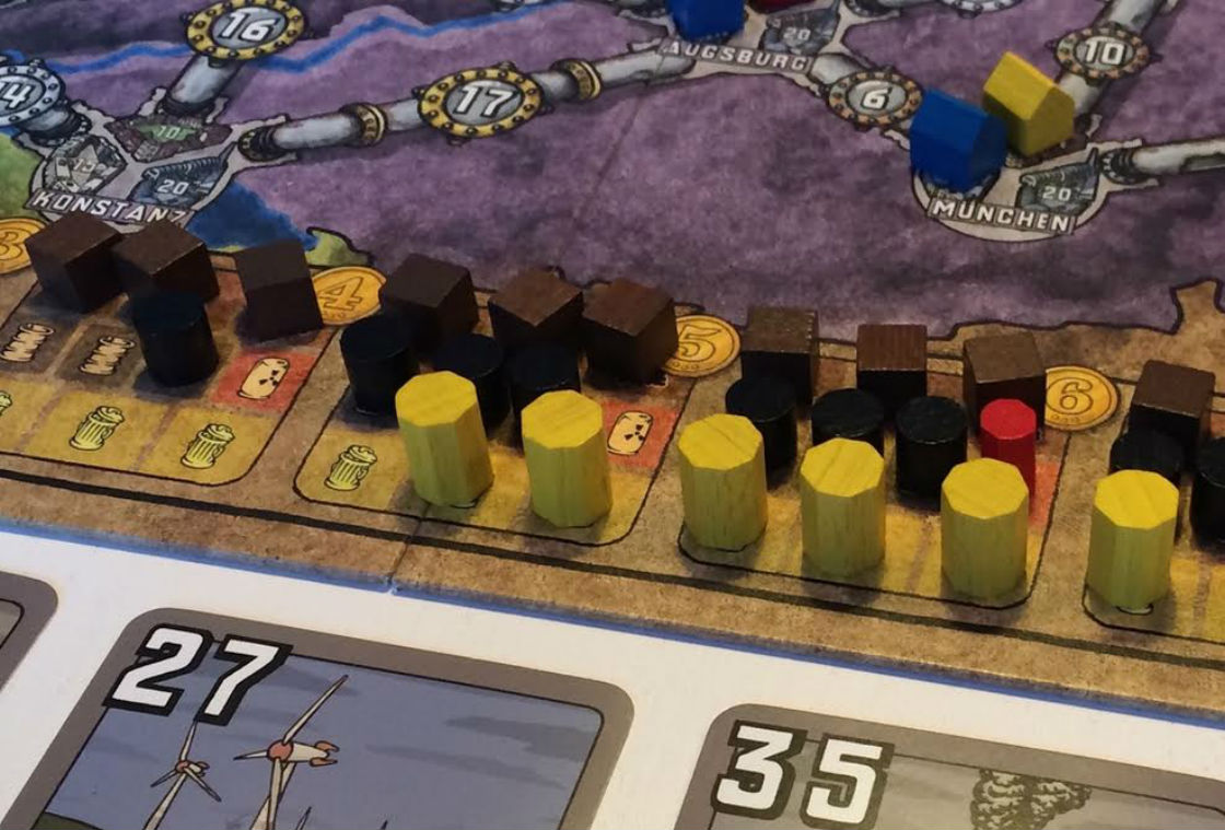 Em "Power Grid", o jogador deve adquriri usinas elétricas para abastecer cidades com energia