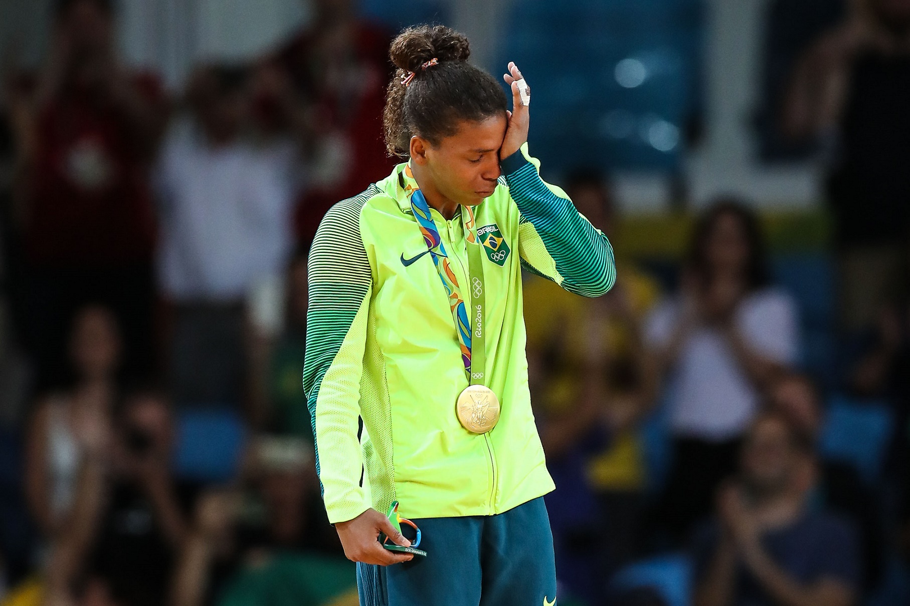 Foto de William Volcov/Brazil Photo Press Rafaela Silva, medalha de ouro no judô, veio da Cidade de Deus, que tem um dos índices de progresso social mais baixos da cidade. Foto de Vanderlei Almeida/AFP