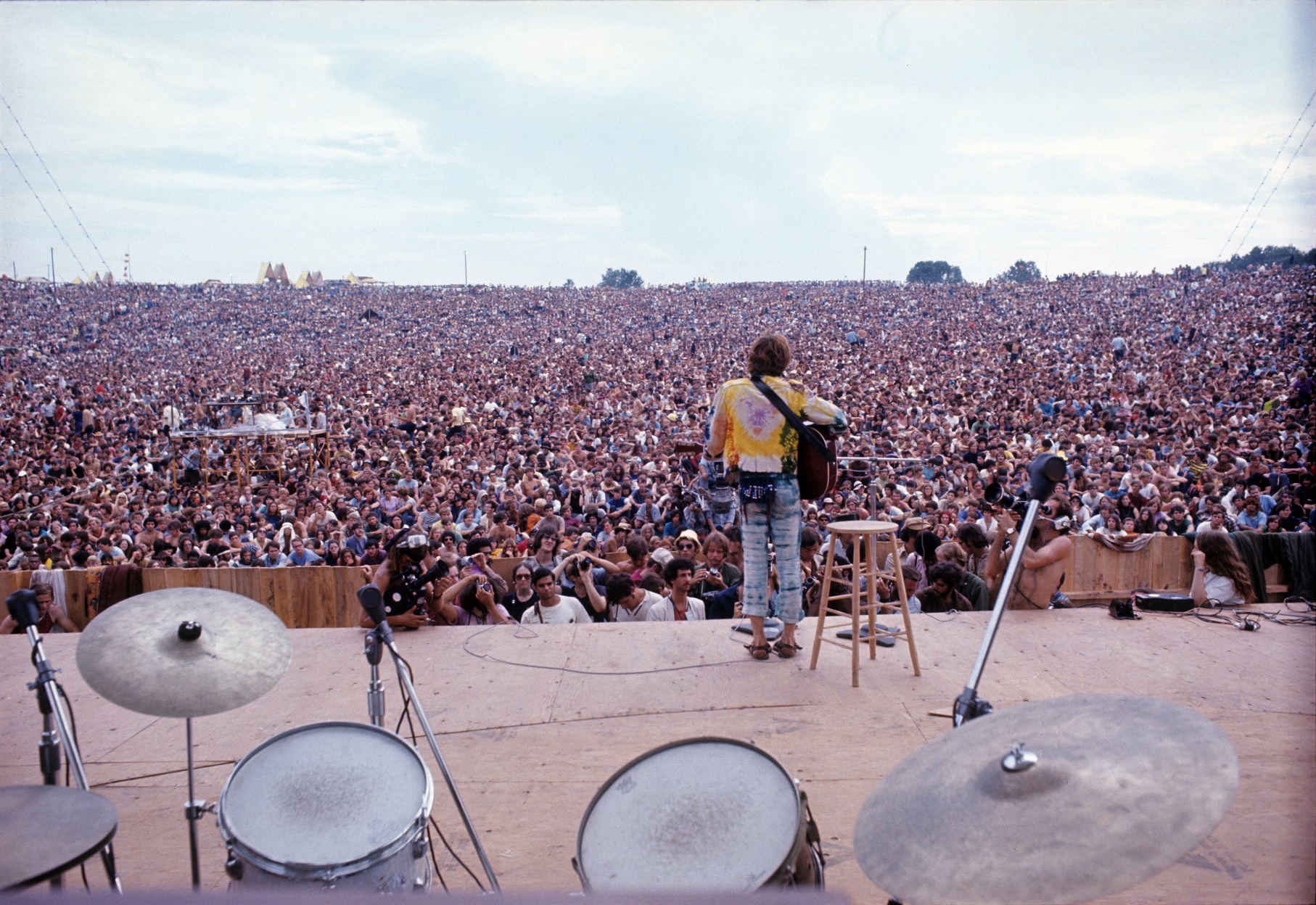 Image by © Henry Diltz/Corbis A apresentação de John Sebastian no Festival de Woodstock, em agosto de 1969. Image by © Henry Diltz/Corbis