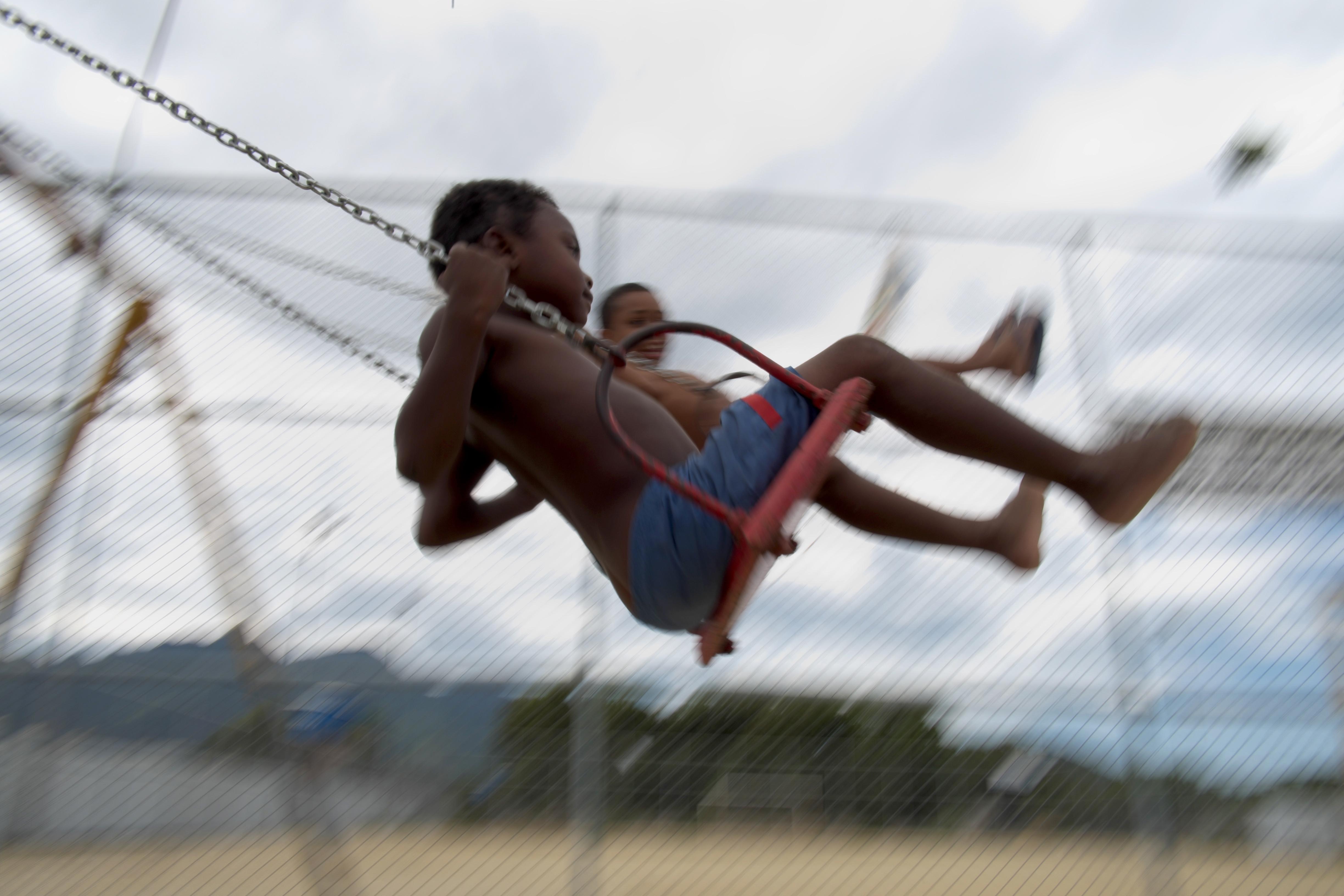 Foto de Christophe Simon/ AFP Crianca brincando/ Foto de Christophe Simon/ AFP