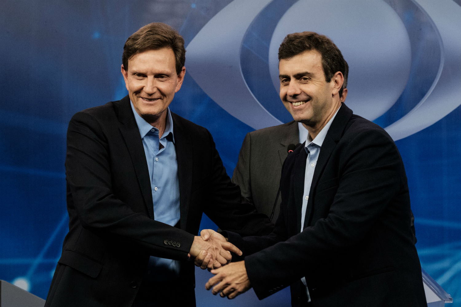Crivella e Freixo no debate da Band (Foto de Yasuyoshi Chiba /AFP)