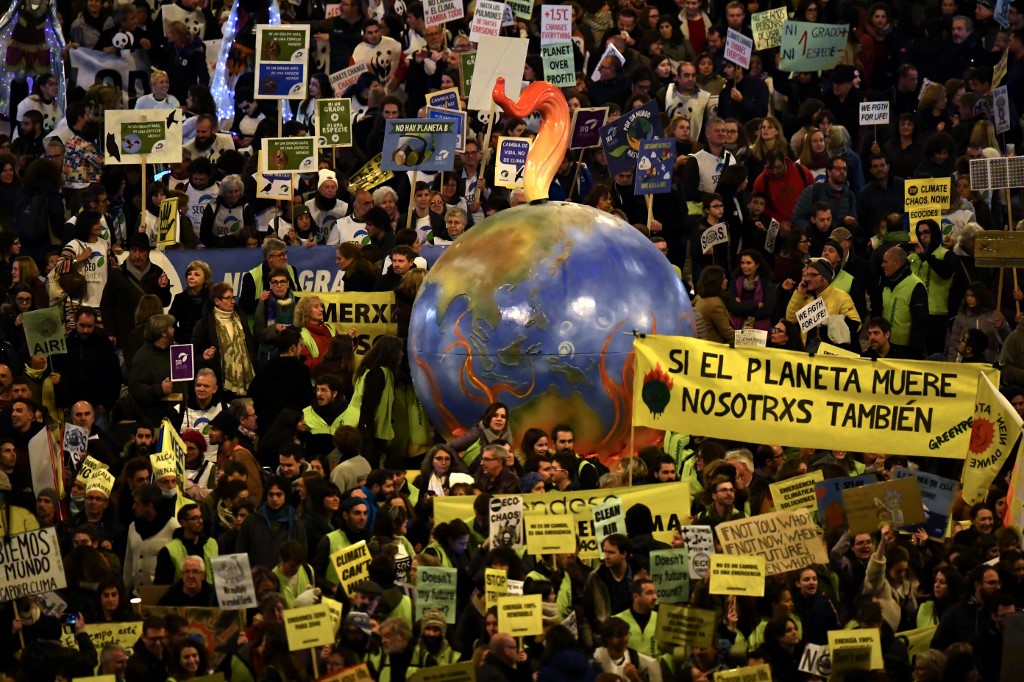 Foto de Gabriel Bouys/ AFP Marcha do clima em Madrid, na COP25. Foto de Gabriel Bouys/ AFP
