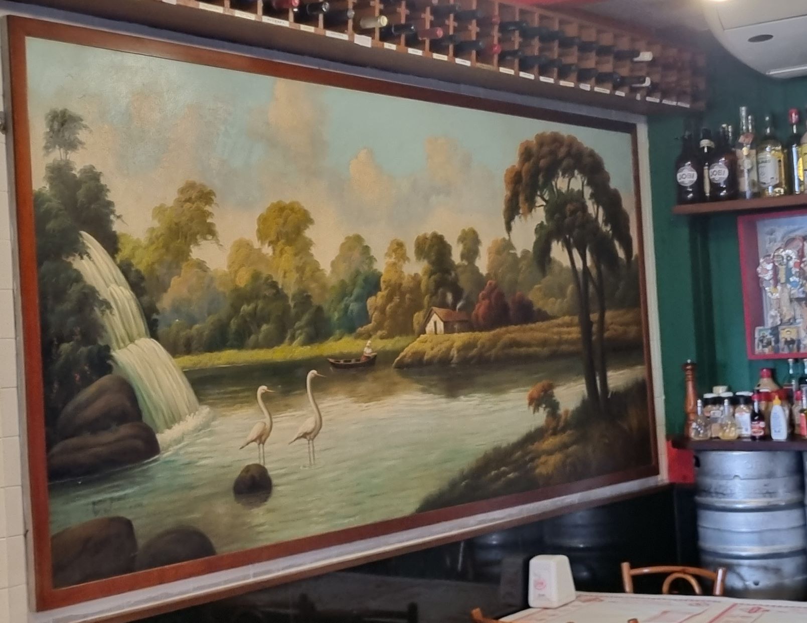 Painel de Nilton Bravo no bar Jobi, no Leblon: lembrança de um tempo quando todo bar carioca queria ter uma obra do pintor na parede (Foto: Oscar Valporto)